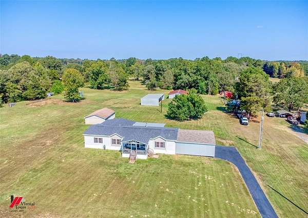 10.4 Acres of Land with Home for Sale in Keithville, Louisiana