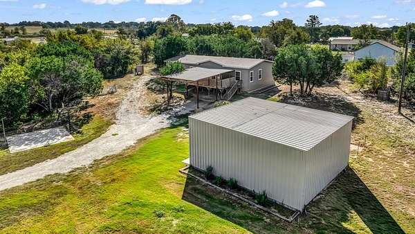 4.37 Acres of Residential Land with Home for Sale in Weatherford, Texas