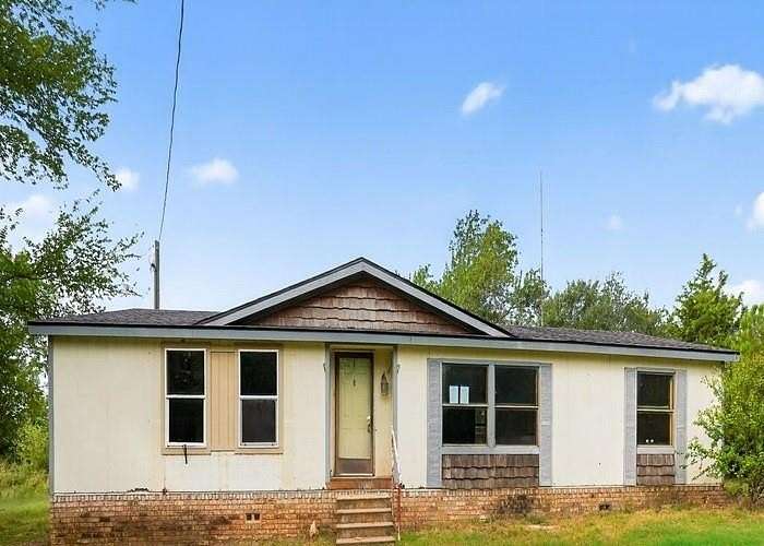 6.1 Acres of Residential Land with Home for Auction in Bowie, Texas