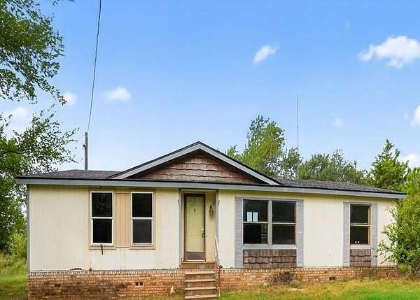 6.1 Acres of Residential Land with Home for Auction in Bowie, Texas