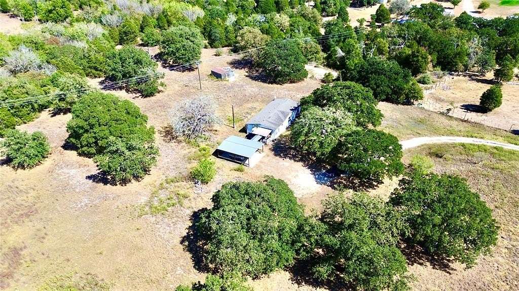 6.5 Acres of Residential Land with Home for Sale in Elgin, Texas