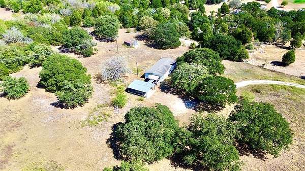 6.5 Acres of Residential Land with Home for Sale in Elgin, Texas