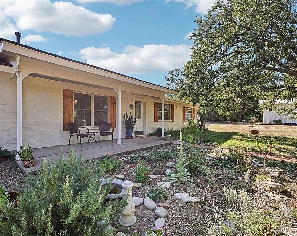 5.2 Acres of Residential Land with Home for Sale in Millsap, Texas