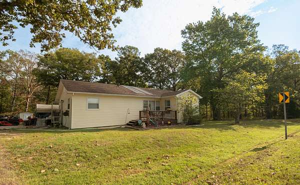 5.4 Acres of Residential Land with Home for Sale in Poplar Bluff, Missouri