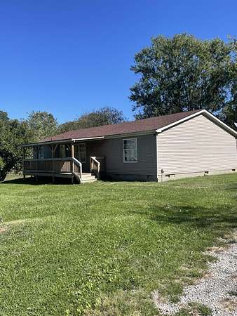 41.2 Acres of Land with Home for Sale in Stamping Ground, Kentucky