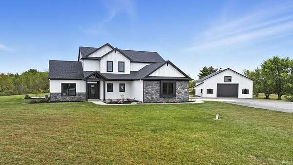 4.5 Acres of Residential Land with Home for Sale in Columbia City, Indiana