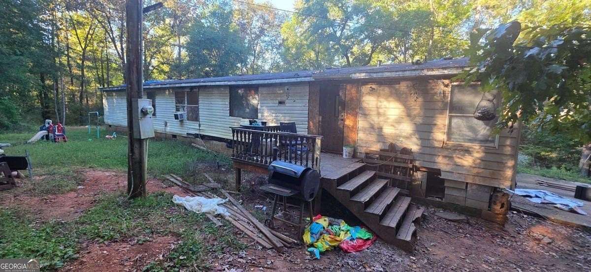 3.78 Acres of Residential Land with Home for Sale in Forsyth, Georgia