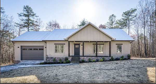 1.5 Acres of Residential Land with Home for Sale in Cunningham, Tennessee