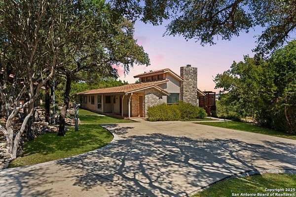 2 Acres of Residential Land with Home for Sale in Canyon Lake, Texas