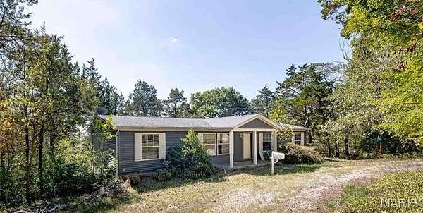 8.54 Acres of Residential Land with Home for Sale in Hillsboro, Missouri