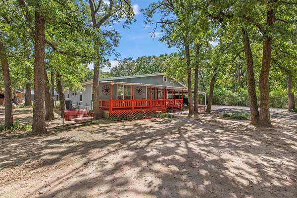 12.8 Acres of Land with Home for Sale in Scurry, Texas