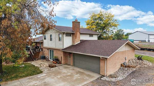 2.33 Acres of Residential Land with Home for Sale in Fort Collins, Colorado