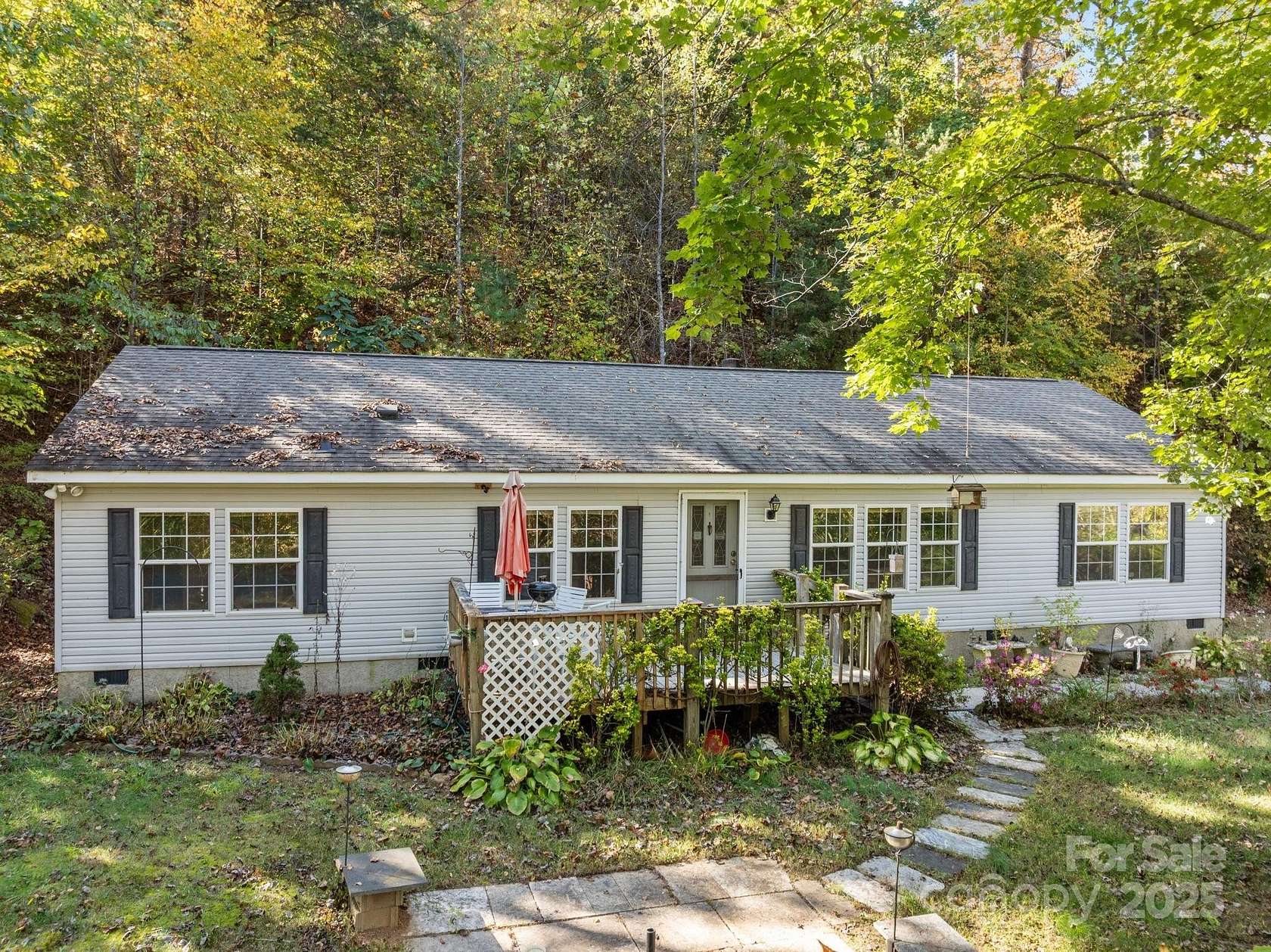 4.8 Acres of Residential Land with Home for Sale in Candler, North Carolina