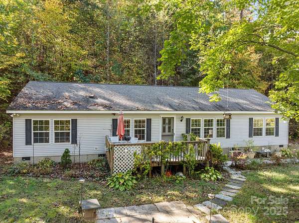 4.8 Acres of Residential Land with Home for Sale in Candler, North Carolina