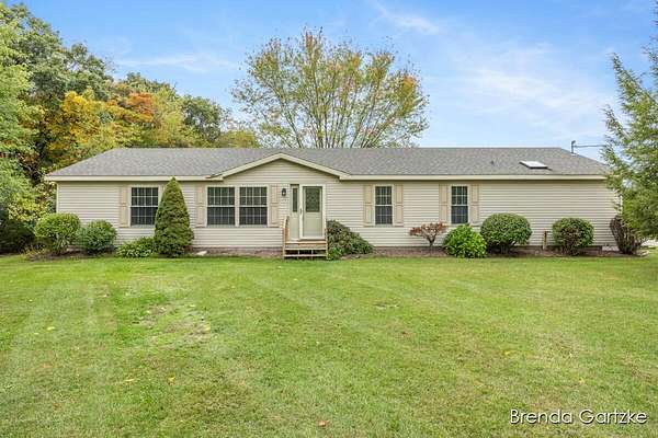 12 Acres of Land with Home for Sale in Rockford, Michigan