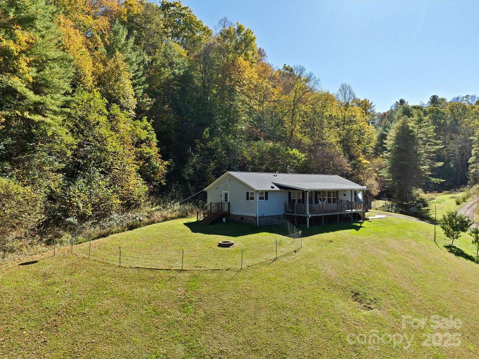 11.4 Acres of Land with Home for Sale in Burnsville, North Carolina