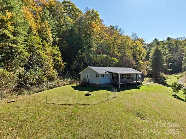 11.4 Acres of Land with Home for Sale in Burnsville, North Carolina