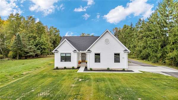 5 Acres of Residential Land with Home for Sale in Olmsted Township, Ohio