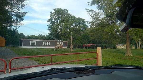 5 Acres of Residential Land with Home for Sale in Danese, West Virginia