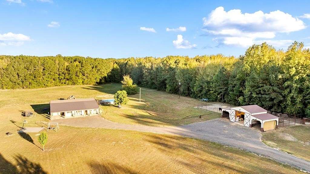 33.3 Acres of Agricultural Land with Home for Sale in De Kalb, Texas