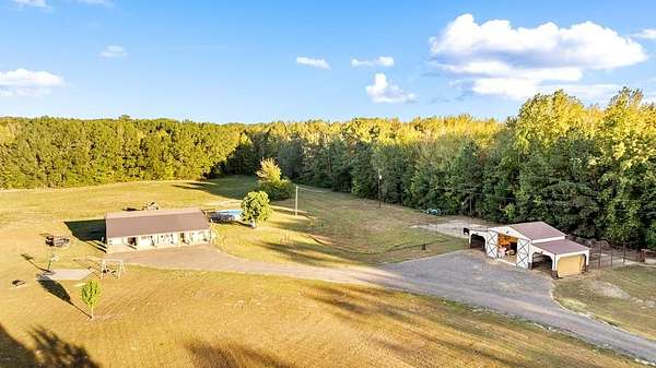 33.3 Acres of Agricultural Land with Home for Sale in De Kalb, Texas