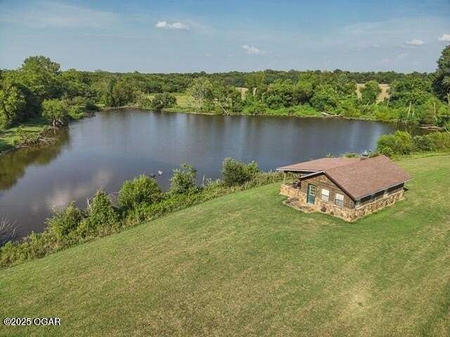 241 Acres of Recreational Land with Home for Sale in Webb City, Missouri