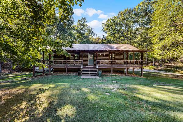 2.64 Acres of Residential Land with Home for Sale in Big Sandy, Tennessee