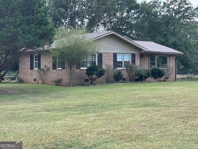 18.3 Acres of Land with Home for Sale in Brooks, Georgia