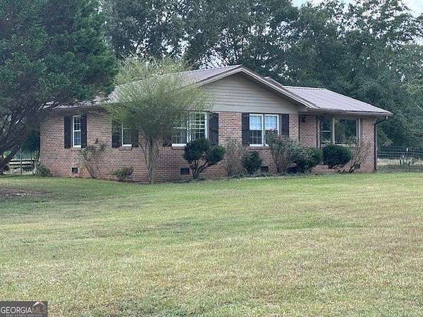 18.3 Acres of Land with Home for Sale in Brooks, Georgia
