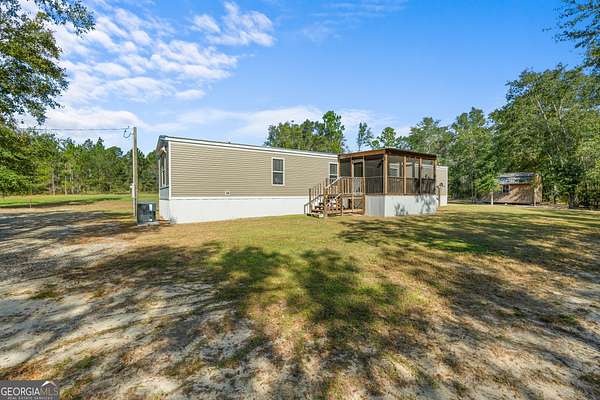 3.29 Acres of Residential Land with Home for Sale in Soperton, Georgia