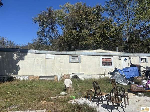 10 Acres of Residential Land with Home for Sale in Horse Cave, Kentucky