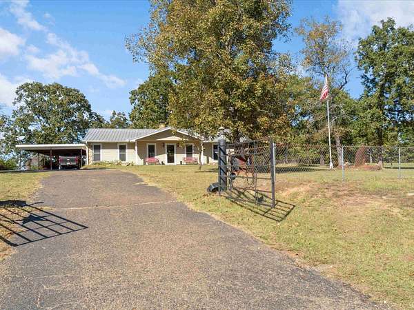 5 Acres of Land with Home for Sale in Pittsburg, Texas