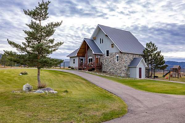 5 Acres of Land with Home for Sale in Kila, Montana