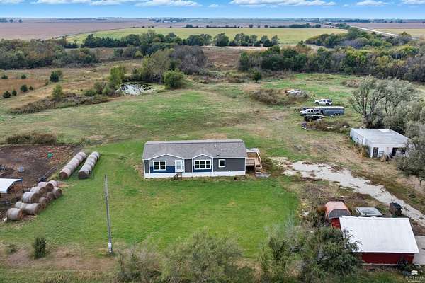 27.5 Acres of Agricultural Land with Home for Sale in Herington, Kansas