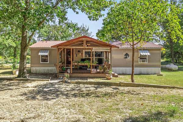 8.68 Acres of Residential Land with Home for Sale in Grannis, Arkansas