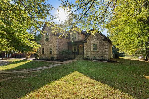 2.4 Acres of Residential Land with Home for Sale in Cottontown, Tennessee