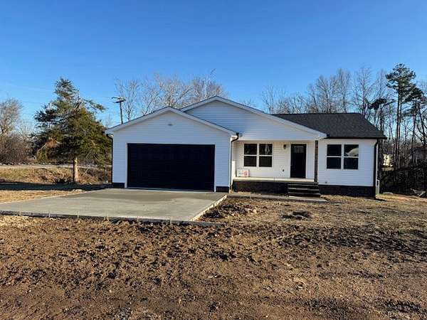 0.67 Acres of Residential Land with Home for Sale in Hohenwald, Tennessee