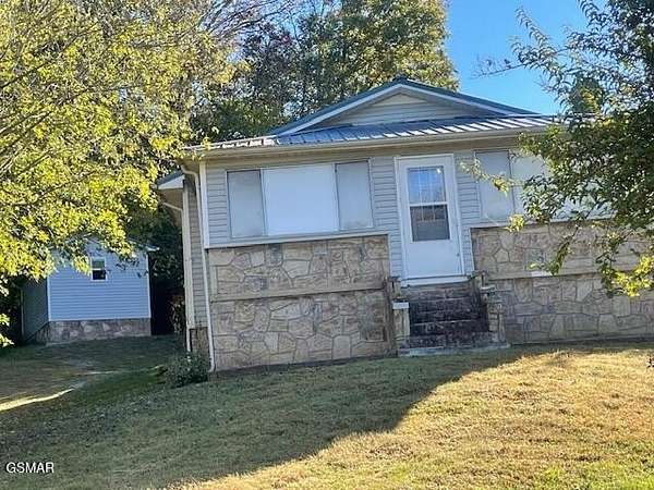 4 Acres of Residential Land with Home for Sale in Sevierville, Tennessee