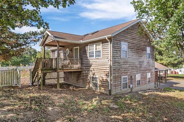 1.78 Acres of Residential Land with Home for Auction in Apple Creek, Ohio