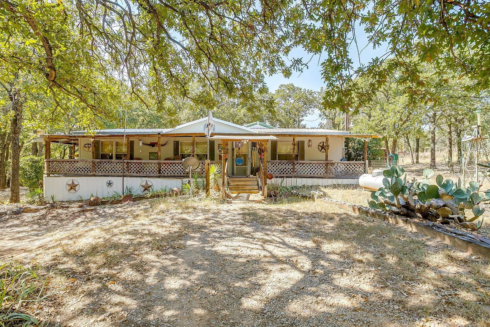 5.76 Acres of Land with Home for Sale in Springtown, Texas
