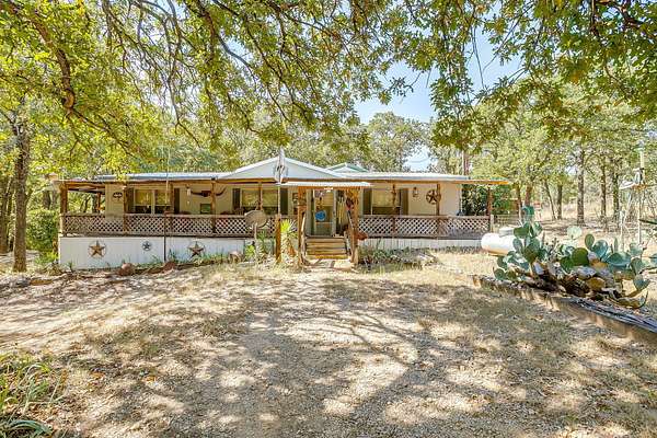 5.76 Acres of Land with Home for Sale in Springtown, Texas