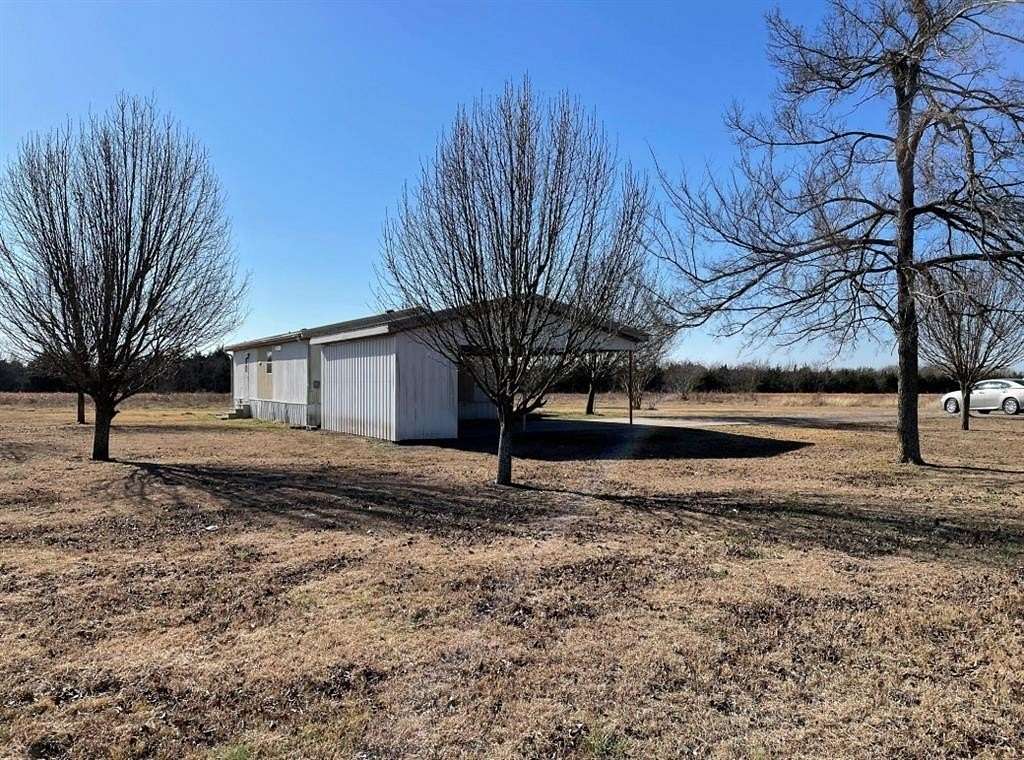 21 Acres of Land for Sale in Wolfe City, Texas