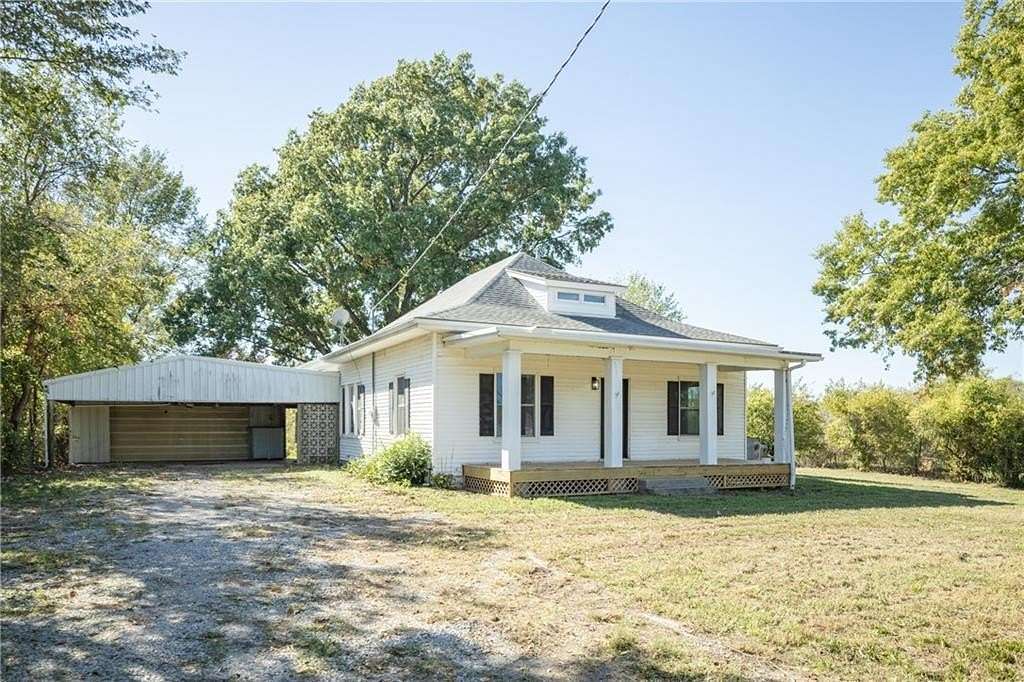 3 Acres of Residential Land with Home for Sale in Higginsville, Missouri