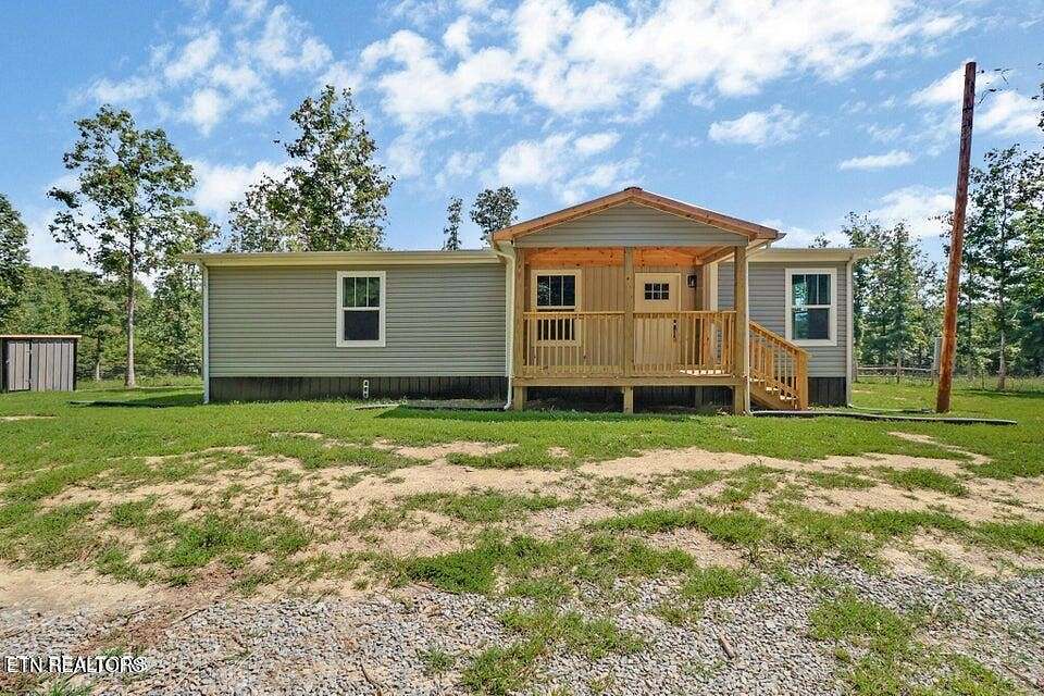 8.52 Acres of Land with Home for Sale in Deer Lodge, Tennessee