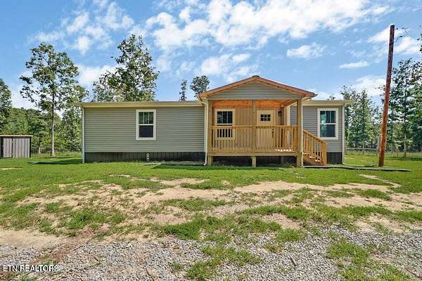 8.53 Acres of Land with Home for Sale in Deer Lodge, Tennessee