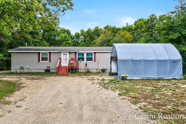 1.7 Acres of Residential Land with Home for Sale in Hamilton, Michigan