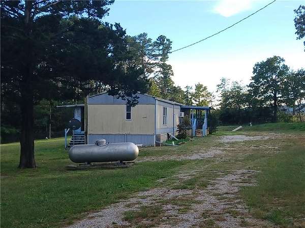 1.62 Acres of Residential Land with Home for Sale in Berryville, Arkansas