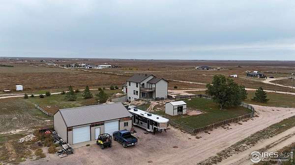 51.7 Acres of Land with Home for Sale in Galeton, Colorado