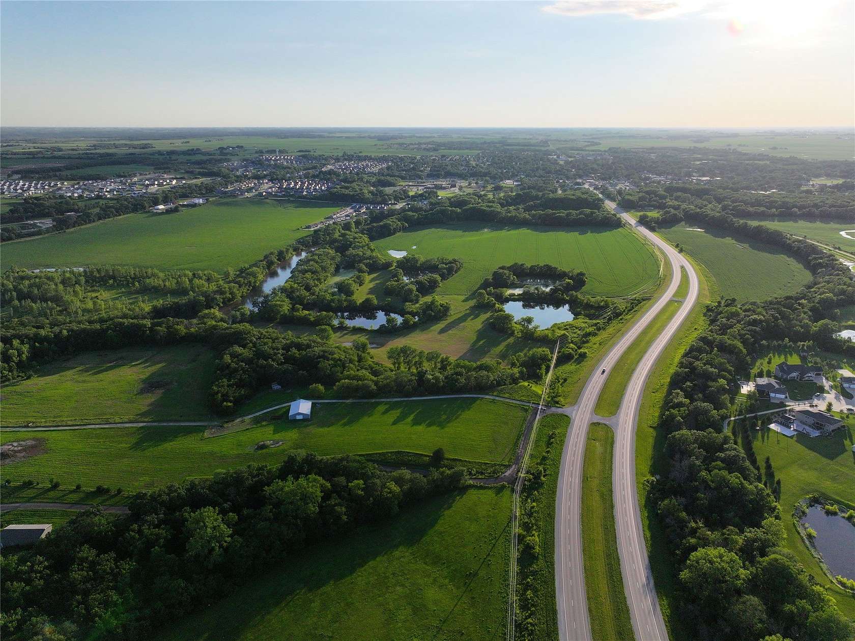 156 Acres of Land for Sale in Adel, Iowa