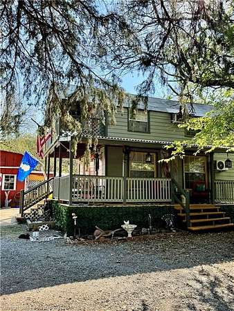 5 Acres of Residential Land with Home for Sale in Hartshorne, Oklahoma